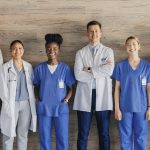 doctors and nurses standing in a row representing medical staffing outlook