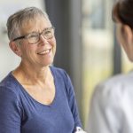 doctor with elderly patient representing recruiting for FQHCs and PACE facilities